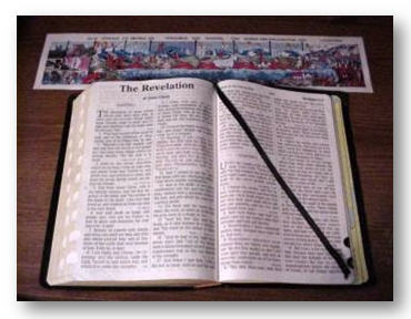 picture of open Bible and Revelation chart
